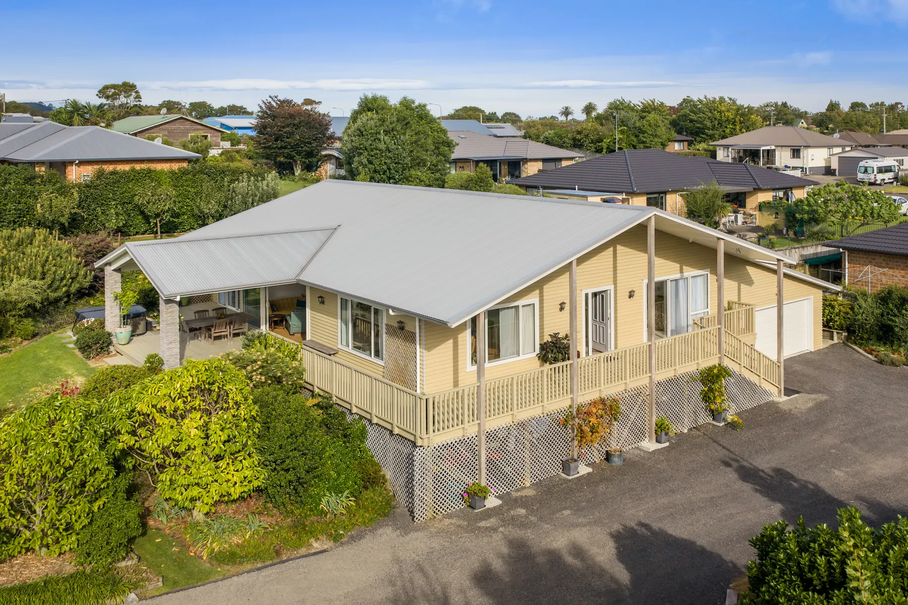 A compact residential home photographed from the air