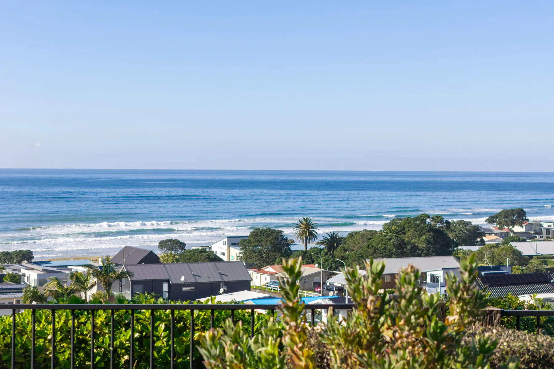 A blue ocean outlook from a coastal property